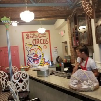 Scoop518 - a woman standing at a counter in a restaurant - Ice Cream & Frozen Yogurt Near Me - Chatham, New York