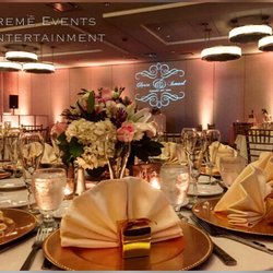 Extreme Events & Entertainment - Springfield Va wedding setup in the Hilton Hotel. Amber Uplighting, Custom Monogram and performance spotlighting along with DJ for 6 hours.
