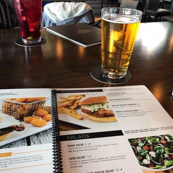 Topgolf - Having a beer, waiting to golf - New American Near Me - Tampa, Florida