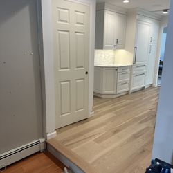 Artista Kitchen & Bath Design - A perfect place to set up a coffee station. The big cabinet is actually a Thermadore refrigerator.