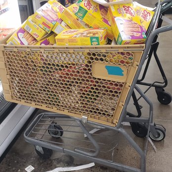 Dollar Tree - Items that require immediate freezing stacked in the aisle next to the frozen foods. Many boxes were completely thawed out. - Discount Store Near Me - Tustin, California