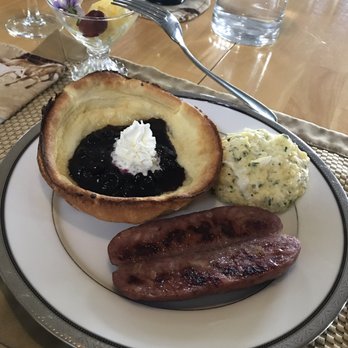 Blue Mountain Bed and Breakfast - German pancake with huckleberries, pineapple sausage, fluffy eggs, fresh fruit - Bed & Breakfast Near Me - Missoula, Montana