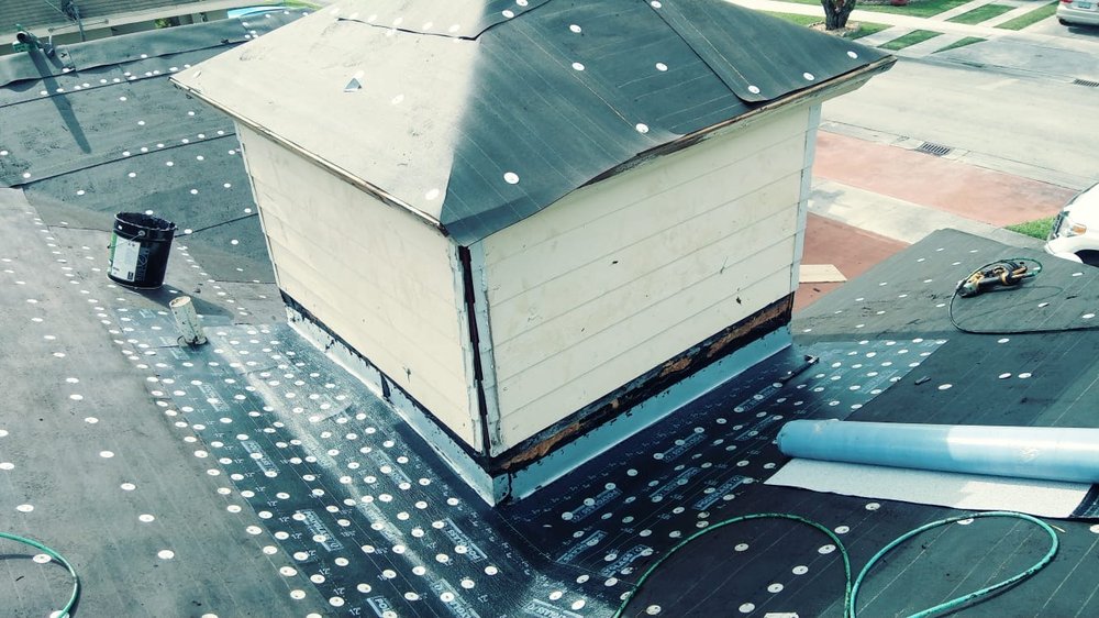 Slide of D-Tech Roofing