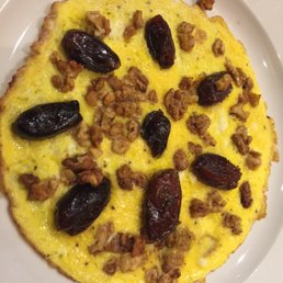 Walnuts and fried dates. What a nice omelette. :-)