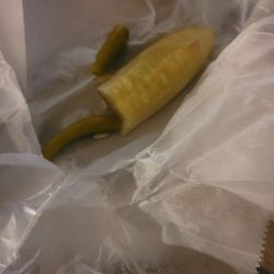 AP Deli - Two sliced pieces of pickle where is my whole pickle there should be five slices