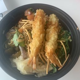 Salmon, shrimp tempura, ginger, seaweed salad, cilantro, pickled jalapeño, scallion Salmon, shrimp tempura, ginger, seaweed salad, cilantro, pickled jalapeño, scallion