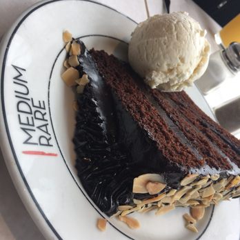 Medium Rare - Triple Layer chocolate cake with vanilla bean ice cream - Steakhouses Near Me - Washington, DC, District of Columbia Medium Rare - Triple Layer chocolate cake with vanilla bean ice cream - Steakhouses Near Me - Washington, DC, District of Columbia