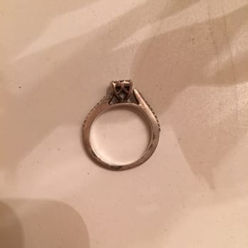 Gaston Jewelers - Look how crooked it is. See how the right side sticks out from under the diamond where the left side sits under the diamond. - Jewelry Near Me - Glendale, Arizona