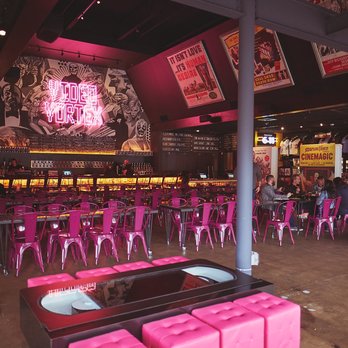 Video Vortex - the inside of a restaurant with pink chairs - Videos & Video Game Rental Near Me - Raleigh, North Carolina Video Vortex - the inside of a restaurant with pink chairs - Videos & Video Game Rental Near Me - Raleigh, North Carolina