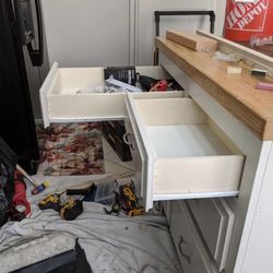 The Castle Rock Handyman - Modified island to accept a trash can pullout. Shortened drawers (original drawer length in background) (1 of 5)