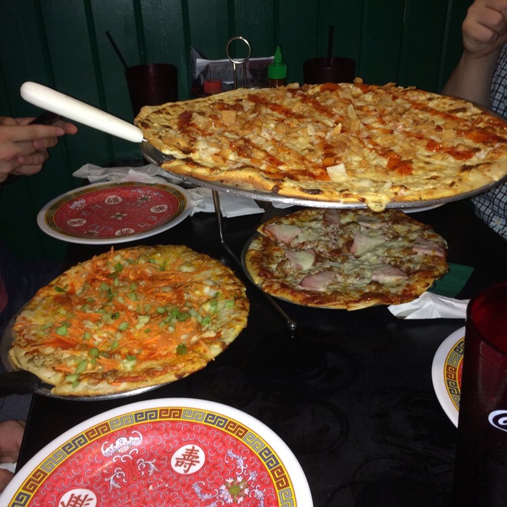 Fong's Pizza - Crab Rangoon (top), Buffalo Chicken (left), Meatatrian (right) - Pizza Near Me - Des Moines, Iowa Fong's Pizza - Crab Rangoon (top), Buffalo Chicken (left), Meatatrian (right) - Pizza Near Me - Des Moines, Iowa