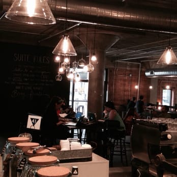 Tout Suite - It's a large space with a dining room area and seating outside - Cafes Near Me - Houston, Texas