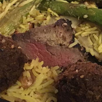 DishDash - Medium rare cubes of lamb over yellow rice - Middle Eastern Near Me - Sunnyvale, California DishDash - Medium rare cubes of lamb over yellow rice - Middle Eastern Near Me - Sunnyvale, California