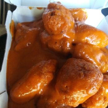 Buffalo Wild Wings - 10 piece spicy garlic boneless wings doing the backstroke in sauce! - Chicken Wings Near Me - Modesto, California