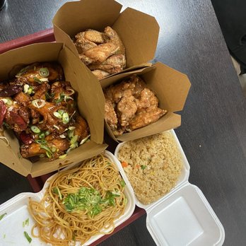 Shlap Muan Chicken Wings - Clockwise from upper left, Cambodian dirt, spicy elephant, fried rice and garlic noodles (small) and dirty Elvis - Chicken Wings Near Me - Long Beach, California Shlap Muan Chicken Wings - Clockwise from upper left, Cambodian dirt, spicy elephant, fried rice and garlic noodles (small) and dirty Elvis - Chicken Wings Near Me - Long Beach, California