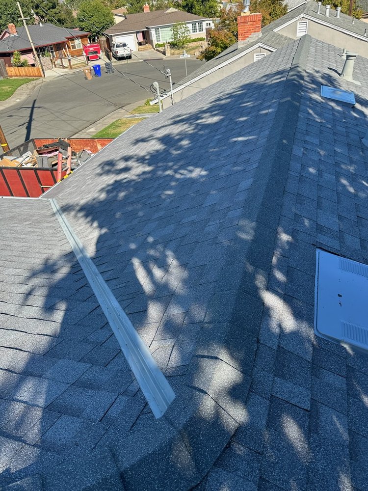 Slide of Zaguilan Roofing Service