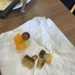 Stacked Pancake & Breakfast House - Rotten potatoes in my hash browns and the egg shell I bit into from my poached  eggs