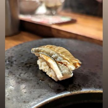 Sushi Jin - a piece of sushi on a plate - Sushi Bars Near Me - New York, New York Sushi Jin - a piece of sushi on a plate - Sushi Bars Near Me - New York, New York