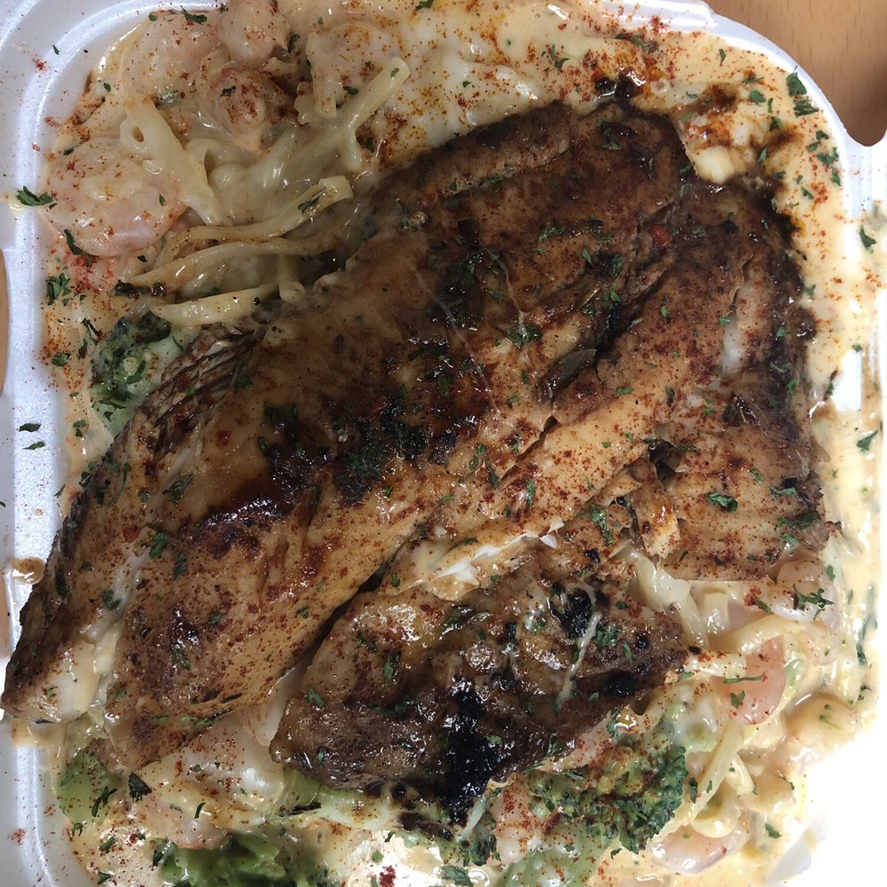 1693 Red Zone Grill - Saturday's Special. This was enough food to feed 2 people. It was so flavorful Seafood pasta with Tilapia - Salad Near Me - Jackson, Mississippi