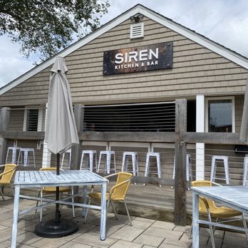 Siren Kitchen and Bar - tables and chairs outside - Cocktail Bars Near Me - Essex, Connecticut Siren Kitchen and Bar - tables and chairs outside - Cocktail Bars Near Me - Essex, Connecticut