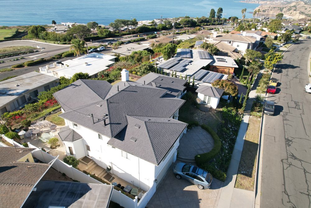 Slide of Enriquez Roofing