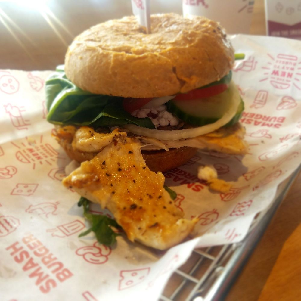 Smashburger - Spinach and Goat Grilled Chicken Sandwich - Burgers Near Me - Bronx, New York Smashburger - Spinach and Goat Grilled Chicken Sandwich - Burgers Near Me - Bronx, New York