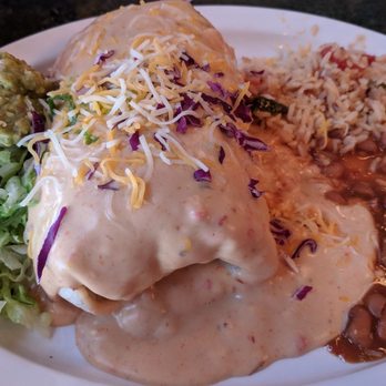 Nacho Mama's - Smothered chicken burrito with rice and beans. Very delicious and HUGE! - Mexican Near Me - Stillwater, Minnesota Nacho Mama's - Smothered chicken burrito with rice and beans. Very delicious and HUGE! - Mexican Near Me - Stillwater, Minnesota