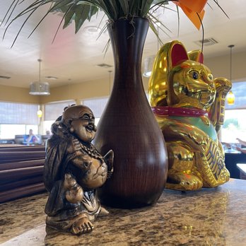 Hao Restaurant - a statue of a monkey and a vase of flowers - Chinese Near Me - Fountain Hills, Arizona Hao Restaurant - a statue of a monkey and a vase of flowers - Chinese Near Me - Fountain Hills, Arizona