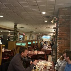 Golden Eagle Bar & Grill - Booth or round tables in front of the fire if you would like. Cheers!