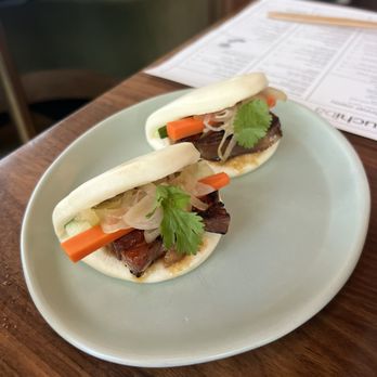 Uchibā Austin - Tiger bao buns. Omg. I wanted to order more. The buns are light and fluffy and the cilantro adds a nice fresh taste. - Cocktail Bars Near Me - Austin, Texas