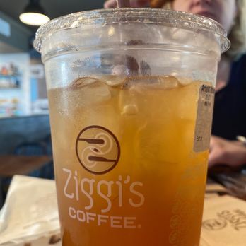Ziggi's Coffee - Arnold Palmer with my wife enjoying a chocolate croissant in the background. - Coffee & Tea Near Me - Albuquerque, New Mexico