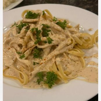Men In The Kitchen - Fettuccine Alfredo - Rich & creamy fettuccine pasta, tossed in a parmesan and parsley sauce. - American Near Me - Harrisburg, Pennsylvania