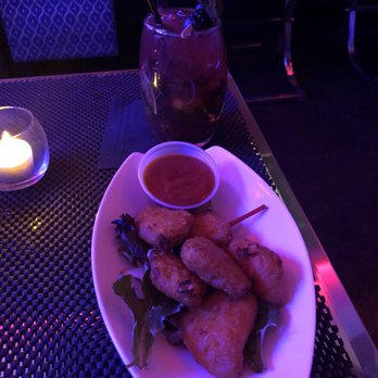 Sugar N Coal - Mac n' cheese bites ($7) -- friend said they were good! Back is a Very Berry Mojito mocktail ($6). - Hookah Bars Near Me - Rego Park, New York