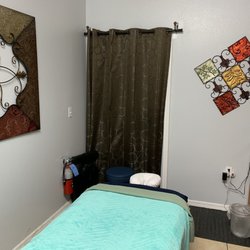 Ideal Massage - One of if many rooms-- this one w/o a wall mural. The lights went off for the massage