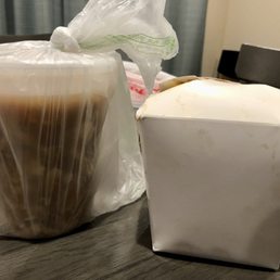 a cup of coffee and a bag of noodles