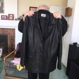 Jacket cleaned but slightly faded. Jacket cleaned but slightly faded.