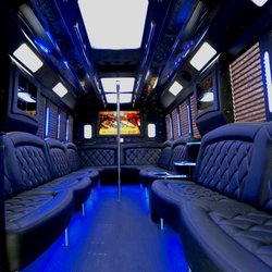 OC Cannabis Tours - Our Legend Party Bus interior has 4 Flat Screen TV's, a large bar area, dance pole and top of the range sound / lighting systems