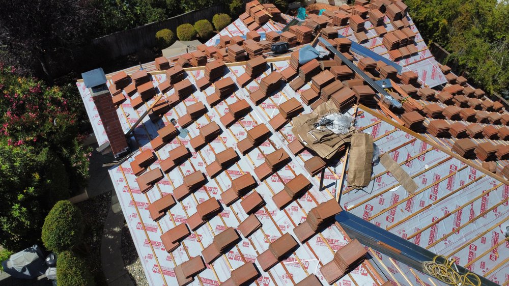 Slide of Six Star Roofing