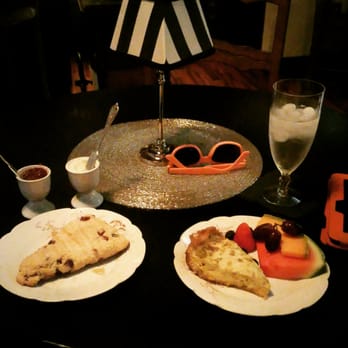 The Gladstone - Scone served with jam and clotted cream, and Quiche Lorraine served with fresh fruit. - Coffee & Tea Near Me - Goldsboro, North Carolina