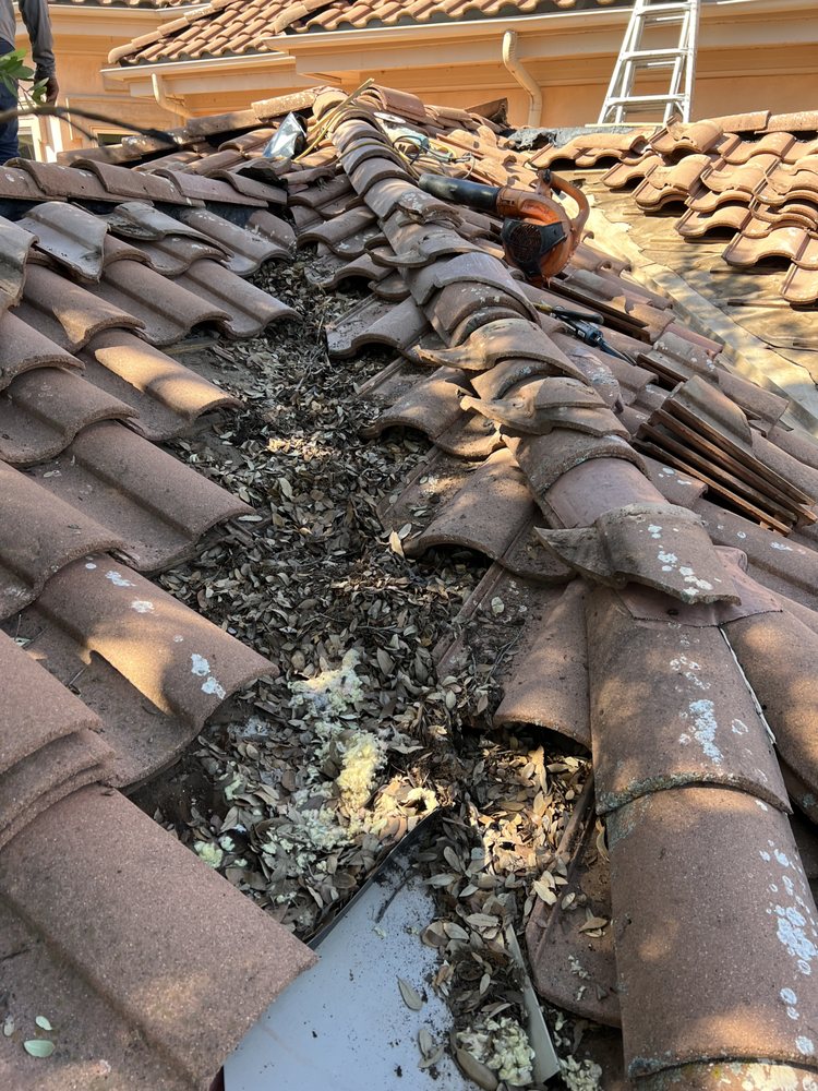 Slide of Arbiter Roofing