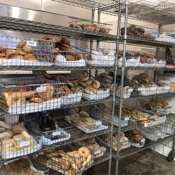 Manhattan Bread & Bagel - Bagels behind the counter. $9.99 per baker's dozen - Bagels Near Me - Manhattan Beach, California Manhattan Bread & Bagel - Bagels behind the counter. $9.99 per baker's dozen - Bagels Near Me - Manhattan Beach, California