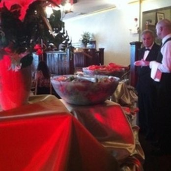 Exclusive Buffet Catering - a man standing in front of a buffet - Caterers Near Me - Fall River, Massachusetts Exclusive Buffet Catering - a man standing in front of a buffet - Caterers Near Me - Fall River, Massachusetts