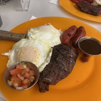 Uncle Mike's Place - Longanisa and Skirt Steak Combo - Breakfast & Brunch Near Me - Chicago, Illinois Uncle Mike's Place - Longanisa and Skirt Steak Combo - Breakfast & Brunch Near Me - Chicago, Illinois