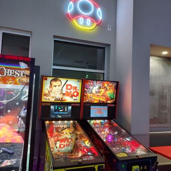 LVL Up Pizza Arcade - a row of pinball machines - Pizza Near Me - Pooler, Georgia LVL Up Pizza Arcade - a row of pinball machines - Pizza Near Me - Pooler, Georgia