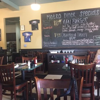 Metro Diner - Metro diner specials hanging on the wall. - Breakfast & Brunch Near Me - Jacksonville Beach, Florida