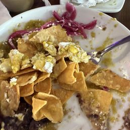 chilaquiles verdes with scramble eggs,and iced coffee