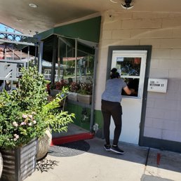 a woman opening the door
