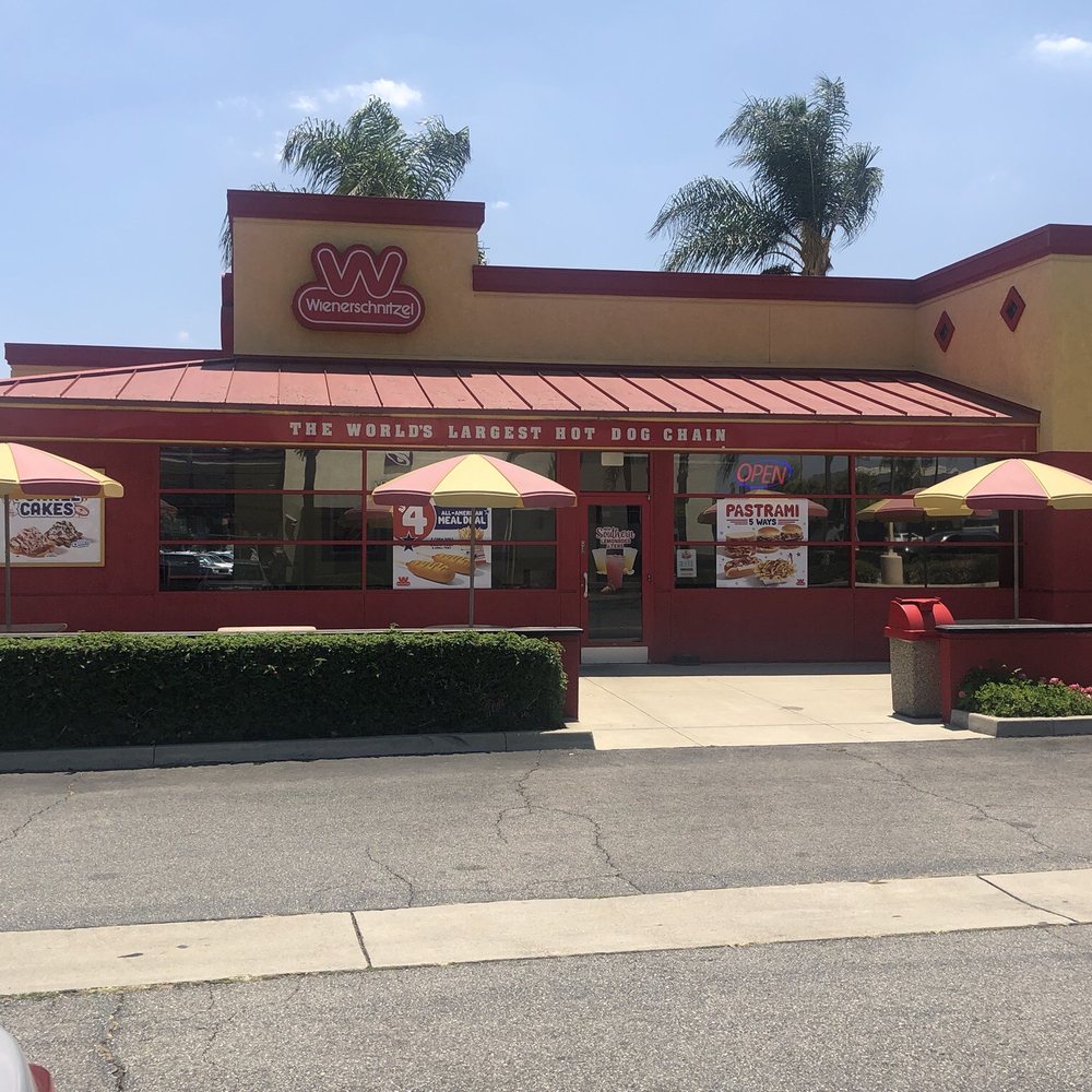 Wienerschnitzel - Doesn't he look good. I said is a he because they sell hotdogs and corn dogs lol - Fast Food Near Me - La Puente, California Wienerschnitzel - Doesn't he look good. I said is a he because they sell hotdogs and corn dogs lol - Fast Food Near Me - La Puente, California