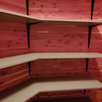 Miguel's Floors - shelves in the corner of a room - Flooring Near Me