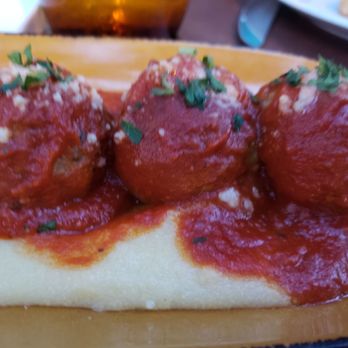Dolce Italian - Meatballs.  They come in 3 and the waiter added one more to accommodate our table - Italian Near Me - Miami Beach, Florida